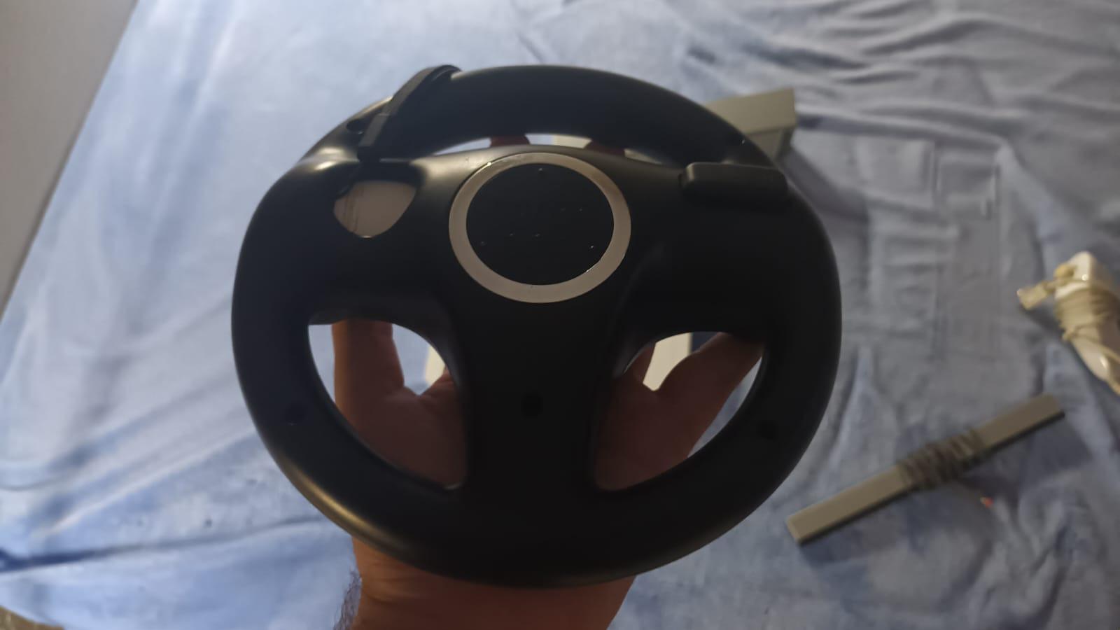 Foto 7 de Nintendo Wii blanca con varios accesorios y "magia"