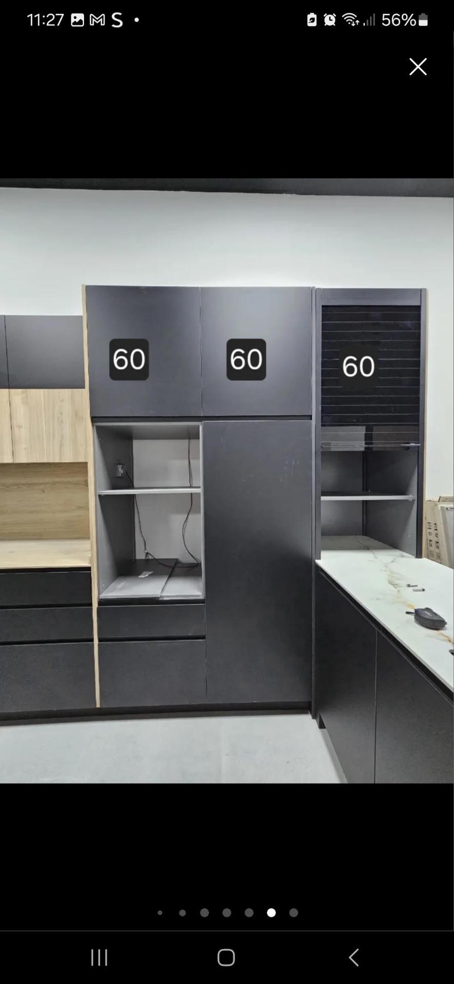 Foto 6 de Cambio cocina exposición con Neolith Abu Dhabi y Dekton, combinación negro con roble.