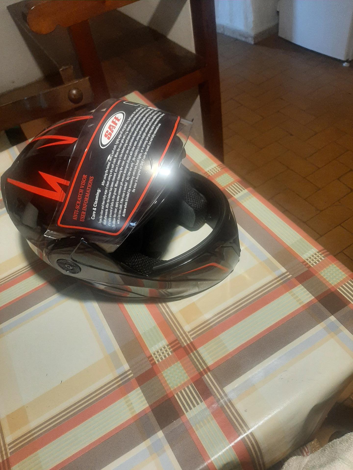 Foto 5 de traje de moto.botas i dos cascos vendi