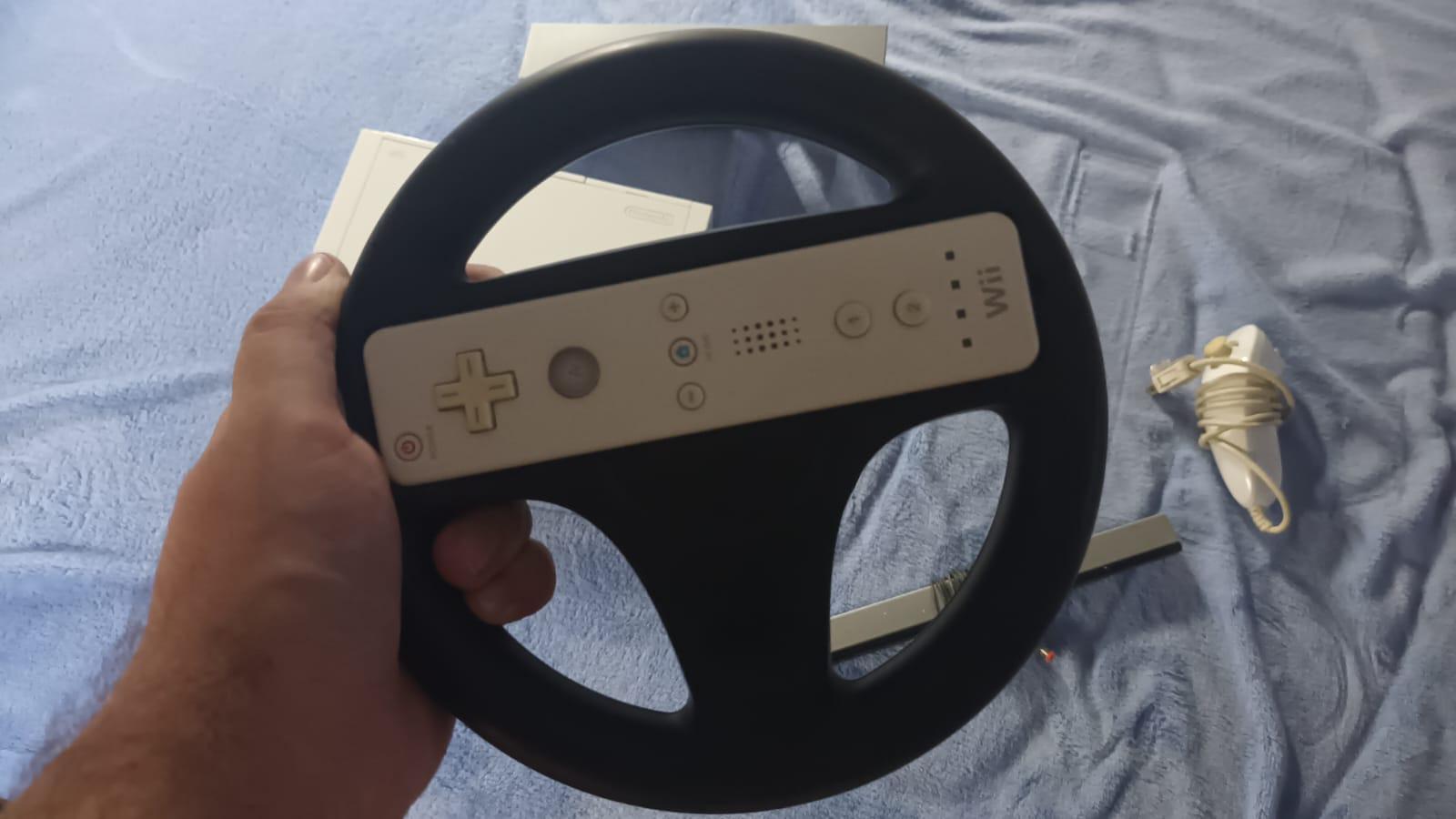 Foto 8 de Nintendo Wii blanca con varios accesorios y "magia"