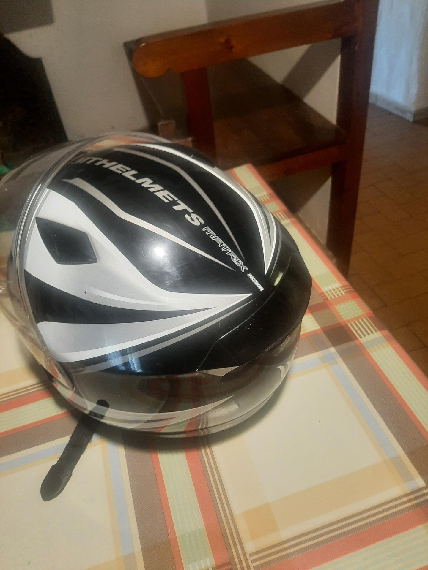 Foto 6 de traje de moto.botas i dos cascos vendi